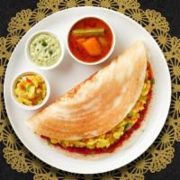 Victory Vijayawada Special Dosa · Savory crepe made of rice & lentil batter topped off with a house special Spicy Sauce, Upma,...