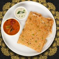 Rava Rave Dosa · Crispy and flaky rava dosa is made of semolina, rice flour and all purpose flour- served wit...