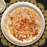 Ultimate Uthappam · Savory pan cake made of rice & lentil batter - served with chutneys and Sambar