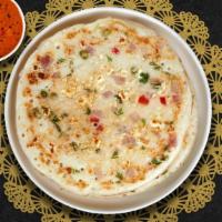 Having Paneer You Near Me Uttapam · Savory pan cake made of rice & lentil batter topped off with house special Paneer spread (In...