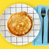 LABC Pancakes · Two fluffy pancakes served with a side of butter and syrup. Morning sunshine.