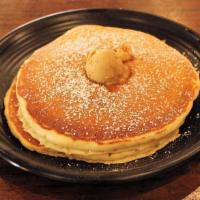 Short Stack Buttermilk Pancakes · TOPPED WITH OUR HOMEMADE MAPLE BUTTER.