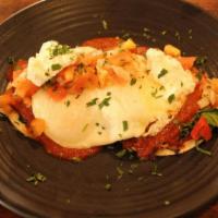 Huevos Rancheros · STUFFED CORN TORTILLAS WITH CHORIZO, SPINACH, BLACK BEANS,. RED PEPPERS, CHEDDAR CHEESE TOPP...