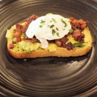 Avocado Toast · ONE SOFT POACHED EGG AND CRISPY HARDWOOD SMOKED HONEY CURED BACON ON THICK SLICED PAN LEVAIN .
