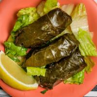 Stuffed Grape Leaves (Dolmas) · This wonderful finger food is stuffed with a tantalizing mixture of rice, parsley, garlic, o...
