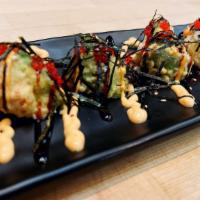 Susi Egg · Deep fried avocado and cream cheese mixed with house special sauce and tobiko.