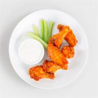 Chicken Wings · Six freaking good chicken wings in buffalo sauce with a side of ranch.