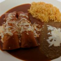 1. Meat Enchilada Plate · Two meat enchiladas topped with home made mole and cheese with a side of rice and beans.
Now...