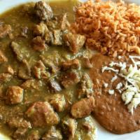 6. Chile Verde Dinner · Home made chile verde  with corn or flour tortilla with a side of rice and beans .