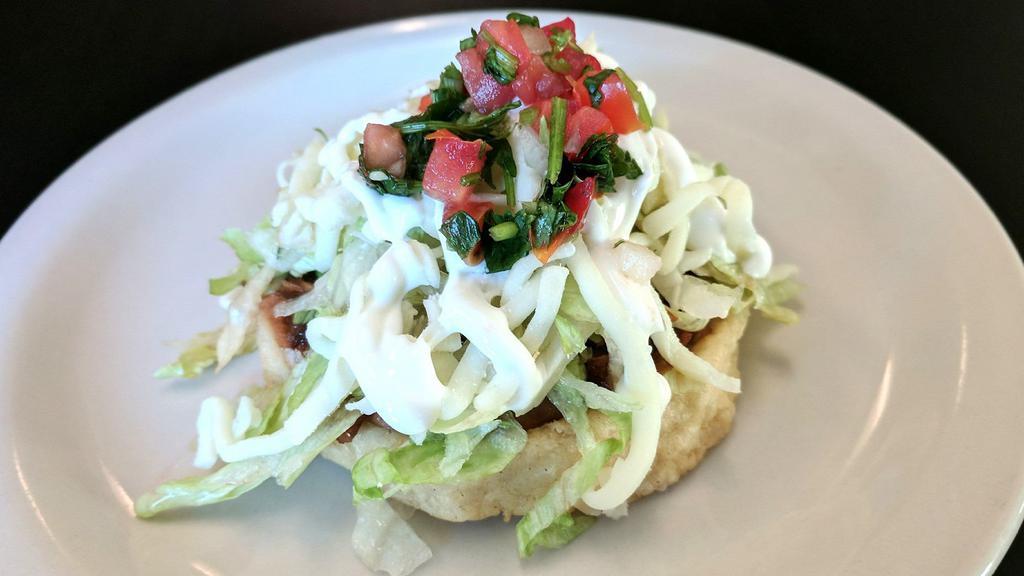 Sope · Hand made thick tortilla topped with refried beans, meat, lettuce, cheese, guacamole, sour cream and pico de gallo.
Now any meat of your choosing at no additional charge except for Shrimp or Fish