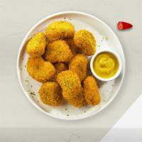 Veggie Vigil Nuggets · 5 crispy, golden, tempura-battered plant-based nuggets.