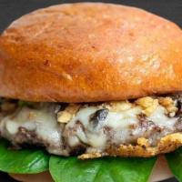 Swiss & Shroom Meltburger · Loads of melted swiss, Grilled mushrooms, fresh spinach, crispy onions  and ranch with our 1...