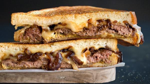 Patty Melt · Grilled Angus & Wagyu beef patty, sweet, caramelized onions, melted swiss and provolone cheese with spicy mustard on artisan french bread