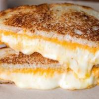 Three Cheese Classic · Sharp cheddar, muenster and fontina cheeses on artisan french bread