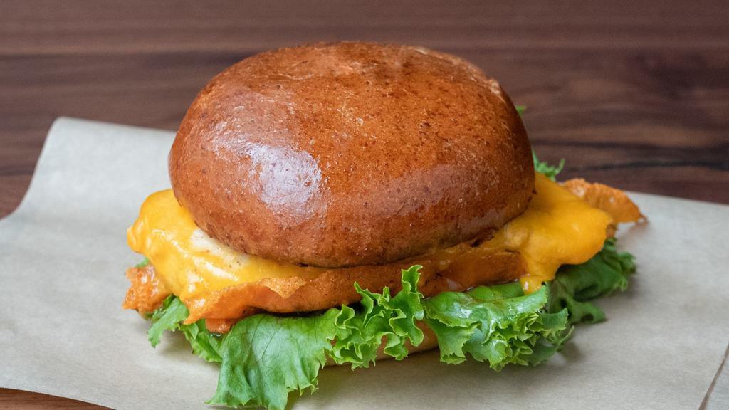 Original Chicken Melt · A juicy, seasoned chicken breast with cheddar, tomato, lettuce, with Melt Sauce on a toasted, artisan bun