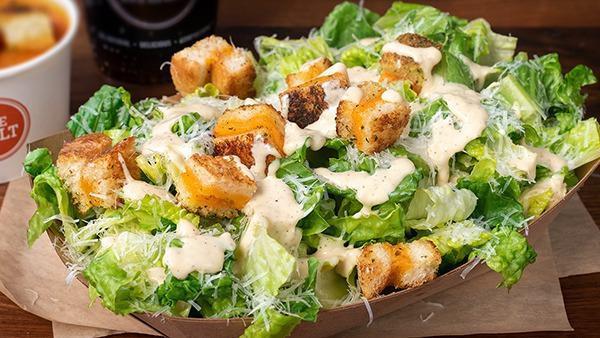 Caesar Salad · Romaine, shaved parmesan, w/grilled cheese croutons
