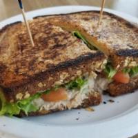 Tuna Melt Sandwich · Grilled fresh light tuna, add tomatoes on request.