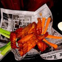 5 Buffalo Wings · Chicken wings tossed with buffalo sauce, with Bleu cheese or ranch dressing.