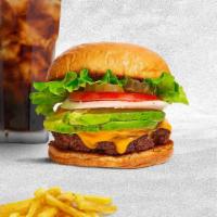 Bravocado Burger · American beef patty topped with avocado, melted cheese, lettuce, tomato, caramelized onion, ...