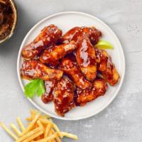 Blaze It BBQ Wings · Fresh chicken wings, fried until golden brown, and tossed in barbecue sauce. Served with ble...