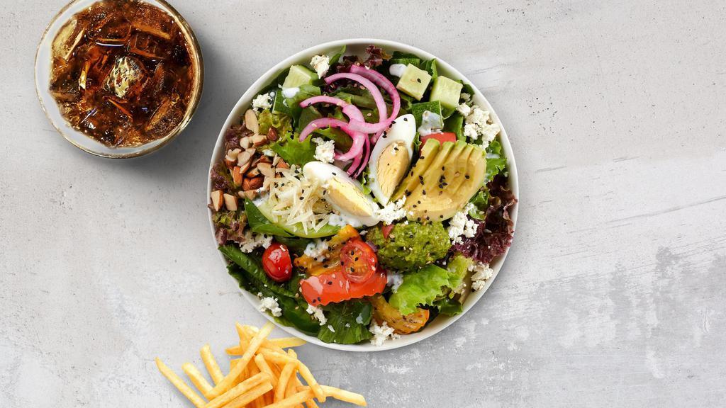 Rivera Salad · Your choice of protein, chopped cabbage, black beans, yellow corn, avocados, tomatoes, onions, and fried tortilla chips, tossed with a parmesan peppercorn ranch dressing.