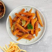 Sweety Fries · Thick-cut sweet potato wedges fried until golden brown