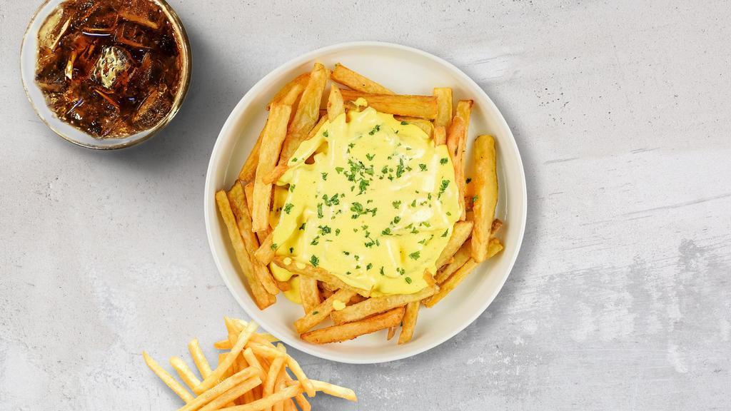 Cheesy Fries · Idaho potato fries cooked until golden brown and garnished with salt and melted cheddar cheese.