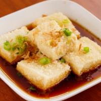 Agedashi Tofu · Tofu cubes lightly fried to a crispy golden brown served with Japanese tempura sauce.