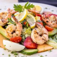 Salade de Crevette · marinated grilled shrimps on a bed of mixed greens with melon, cantaloupe, and avocado with ...