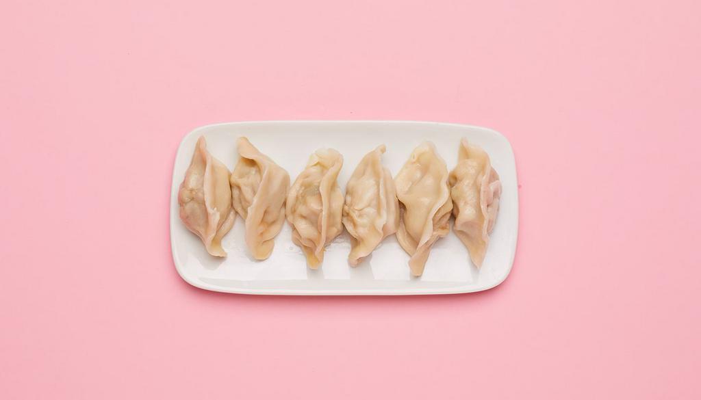 Steamed Dumplings · Steamed dumplings with your choice of filling.