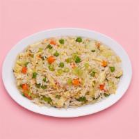 Vegetable Fried Rice · Wok fried rice tossed with onions, mixed vegetables, and fried egg.