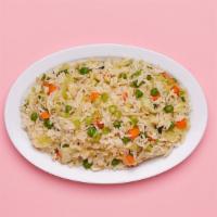 Vegan Fried Rice · Wok fried rice tossed with onions and mixed vegetables.