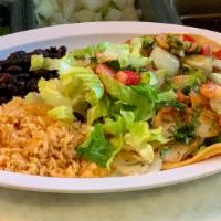 Seafood Taco · cilantro, onions, hot sauce, bell pepper, onions, lettuce, tomatoes and choice of shrimp or ...