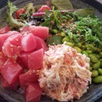 Tuna Poke blow · Raw diced tuna, spring mix, grape tomato, edamame, crab salad, seaweed salad served with hom...