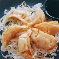Chicken Gyoza · 5 pieces of Deep Fried Gyoza: Soy sauce marinated Chicken, Cabbage, onion, sesame seed oil w...