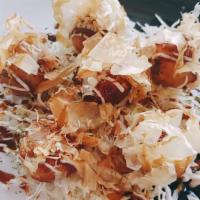 Takoyaki · 6 pieces of Deep fried octopus balls topped with sweet fruity flavour sauce, mayonnaise, sea...