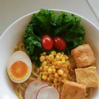 Veggie Miso Ramen · Clear vegetarian broth seasoned with miso.
Soft boiled egg, fried tofu, kale, carrot, grape ...