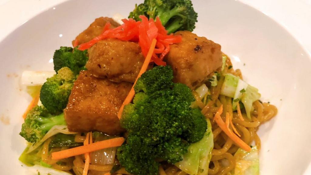 Veggies Yaki Soba · Stir-fried noodle with broccoli, carrot, cabbage, scallion, and pickled ginger on the side.