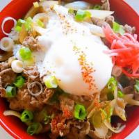 Gyudon · Thinly sliced Angus beef cooked in a homemade slightly sweet sauce topped with white onion, ...