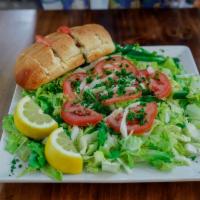 Adulis  special Salad · Lettuce, tomatoes, jalapeno  and onion tossed gently with the right amount of extra virgin o...