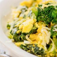Healthy Greens Scramble · Egg whites with kale, spinach, broccoli, green onion, zucchini, and Swiss cheese.
