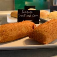 Beef Rissole · Deep fried turnover pastry filled with seasoned meat and corn.