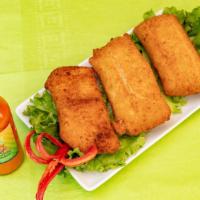 Corn Rissole · Deep fried turnover pastry filled with corn and cheese.