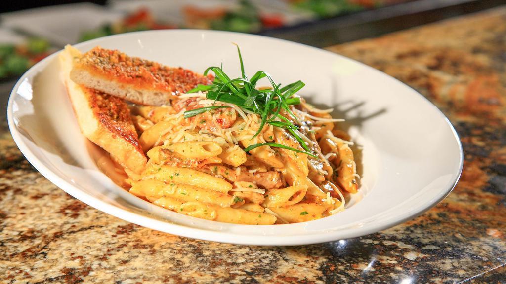 Cajun Pasta · Sautéed onions, sweet peppers, mushrooms, Cajun andouille sausage, and chicken tossed with our spicy Cajun sauce and penne pasta.