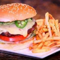 South Of The Border Burger · A half a pound certified Angus beef topped with pepper jack cheese, jalapenos, homemade spic...