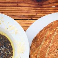 Skip's Dip · Favorite. Our homemade bread sliced and warmed for dipping. Skip's dip is olive oil, balsami...