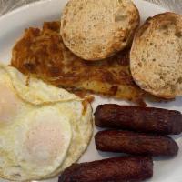 Two Egg Breakfast with Choice of Meat · Bacon, link sausage, patty sausage, ham, or hamburger patty.