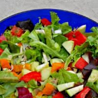 Mixed Green Salad · Lettuce, onion, tomatoes, and cucumber.