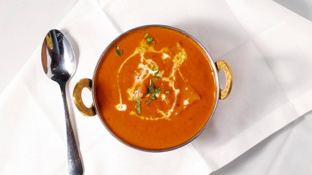 Chicken Tikka Masala (D-Gf) · Boneless skinless chicken cooked in tandoor and blended in a light and creamy masala sauce. (Served with basmati rice).