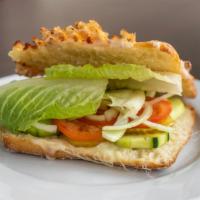 Vegetarian Sandwich/ Panini · Lettuce, tomato, pickles, onion, cucumber, mayo & cheese.
